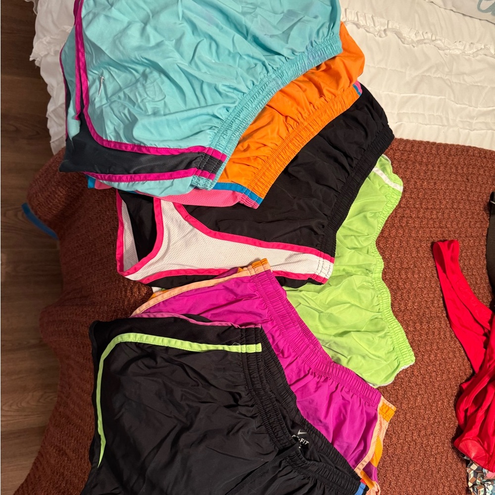 Gently worn women’s dry fit Nike shorts size M, all 6 pairs.